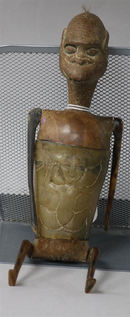 An unusual tribal horn and wood figure